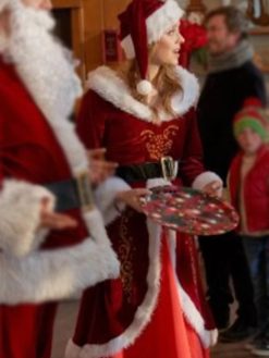 Celeste To Have And To Holiday 2024 Madeleine Arthur Santa Red Long Coat